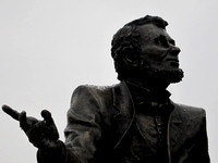 Lincoln’s friend, Jesse Fell, is the left-hand figure in “Convergence of Purpose” by sculptor Andrew Jumonville.