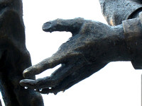 Outstretched hand of Lincoln’s friend, David Davis, the figure on Lincoln’s right in “Convergence of Purpose” by sculptor Andrew Jumonville